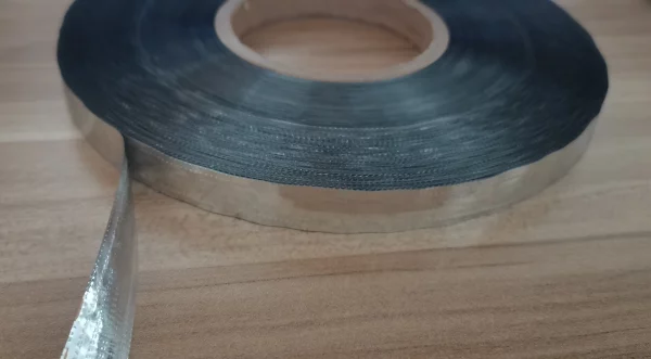 Perforated aluminum plated film destructive tape